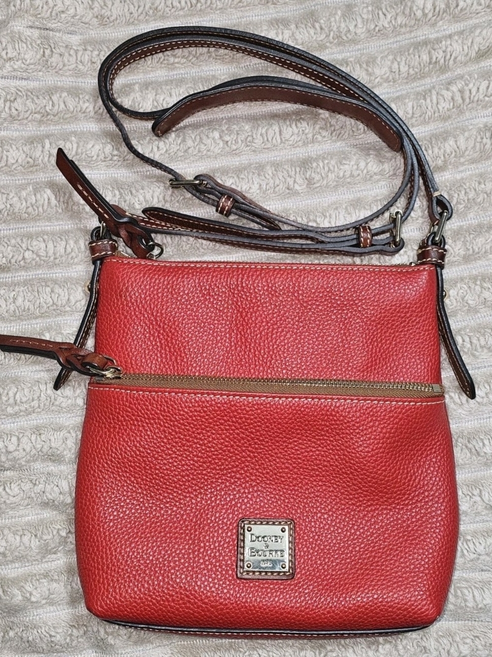 Dooney & Bourke Red Pebbled Leather Wristlet with Brown Strap